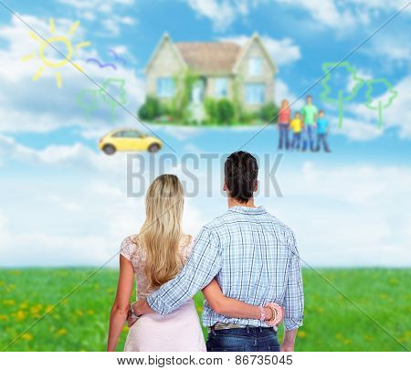Young loving couple looking at new home. Mortgage.