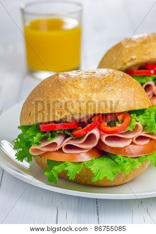 Healthy Sandwiches With Ham And A Glass Of Orange Juice