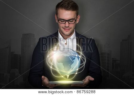 Young Businessman With A Tablet On His Hand