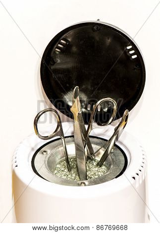 Manicure Accessories In Sterilizer Isolated