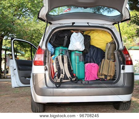 Car Overloaded With Suitcases For Travel