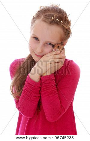 Girl holding a hamster