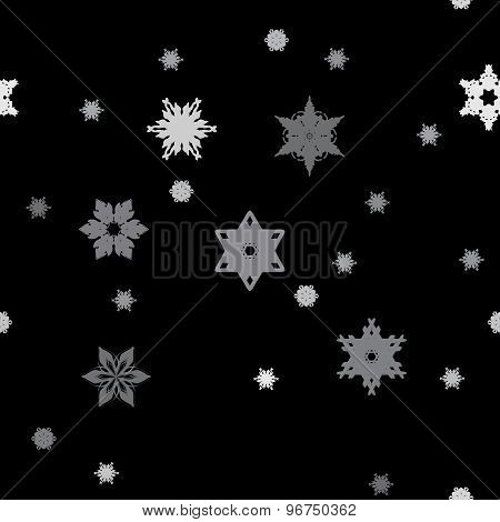 Winter pattern with various falling snowflakes.