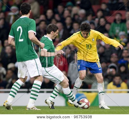 LONDON, ENGLAND. March 02 2010: Ireland's keith Andrews tackles Brazil's Kaka during the international football friendly between Brazil and the Republic of Ireland played at the Emirates Stadium.