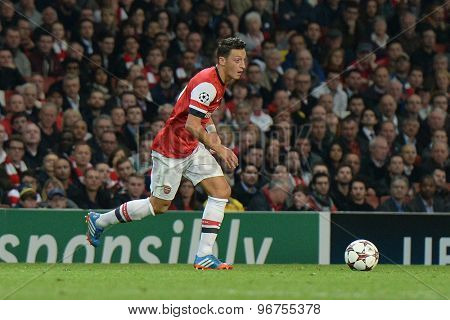 LONDON, ENGLAND - Oct 01 2013: Arsenal's midfielder Mesut Ozil from Germany during the UEFA Champions League match between Arsenal and Napoli.
