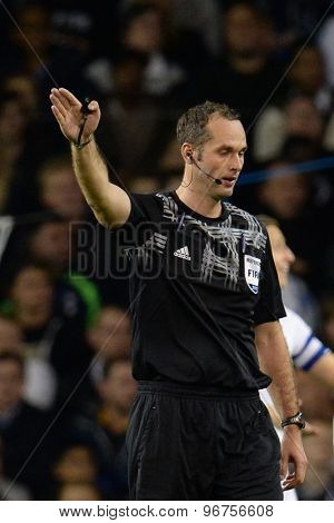 LONDON, ENGLAND - September 19 2013: referee Libor Kovarik during the UEFA Europa League match between Tottenham Hotspur and Tromso played at The White Hart Lane Stadium.