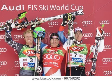 SOELDEN, AUSTRIA Oct 25 2009 Ted Ligety (USA) left, Didier Cuche (SUI) and Carlo Janka (SUI) right, on the podium after finishing 2nd in the mens giant slalom race at the Rettenbach Glacier.