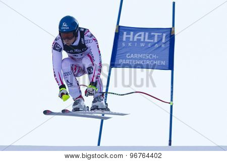 GARMISCH PARTENKIRCHEN, GERMANY. Feb 14 2011: Benjamin Raich (AUT) takes to the air competing in the men's downhill at the 2011 Alpine skiing World Championships