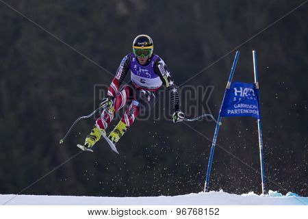 GARMISCH PARTENKIRCHEN, GERMANY. Feb 12 2011: Steven Nyman (USA) takes to the air competing in the men's downhill at the 2011 Alpine skiing World Championships