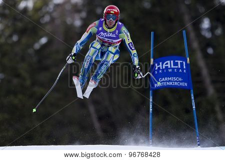 GARMISCH PARTENKIRCHEN, GERMANY. Feb 10 2011: Andrej Jerman (SLO) takes to the air competing in the men's downhill training at the 2011 Alpine Skiing World Championships