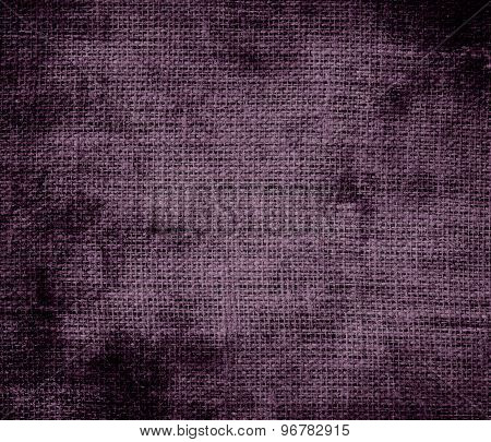 Grunge background of dark byzantium burlap texture