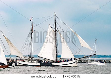 Rostock, Germany - August 2016: Sailing ship Carmelan on the baltic sea. Hanse-Sail Warnemuende at port Rostock, Mecklenburg-Vorpommern, Germany. Tall Ship.Yachting and Sailing travel. Cruises and holidays