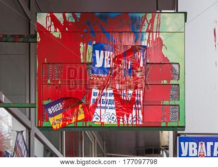 Dnipro Ukraine - March 17 2017 Protest against bank of country aggressor of Russia. Inscription on poster Attention this is bank of aggressor country it will be closed. Take away their money urgently