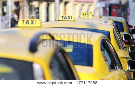 taxi cab standing on the airport waiting stand