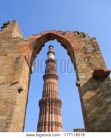 Iconic image of the Qutub Minar monument in New Delhi India is the tallest brick minaret tower in the world.