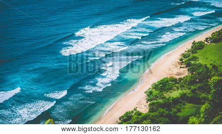 Aerial view of Nunggalan Beach near Uluwatu, Bali, Indonesia.