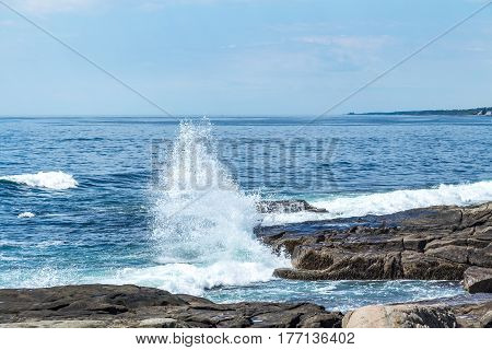 Maine's rocky forest-lined coast has more shoreline than California with inlets bays and coves lapped by frigid Atlantic waters even in the warmest of summers. Nearly 60 percent of Maine's coastline is composed of hard rock.