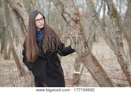 Portrait Of A Beautiful Girl In A Dark Forest