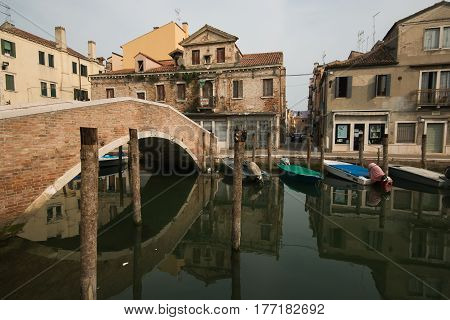 CHIOGGIA, ITALY - MARCH 19, 2017: Abandoned renaissance building in old city of Chioggia, Italy