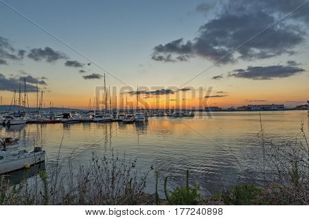 SOZOPOL, BULGARIA - JULY 13, 2016: Amazing Sunset at the port of Sozopol, Burgas Region, Bulgaria