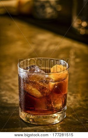 campari orange soda cocktail drink in modern bar