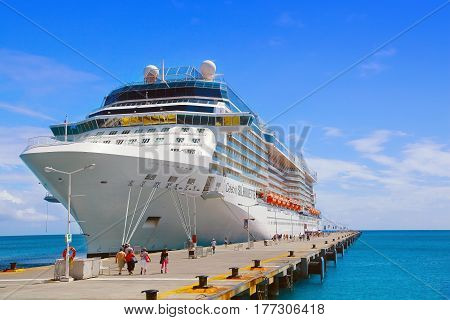 PHILISBURG, ST. MARTEEN - APRIL 16,2015:  Cruise ship Celebrity Silhouette, docked at Philisburg, St. Marteen harbor on a clear sunny day.