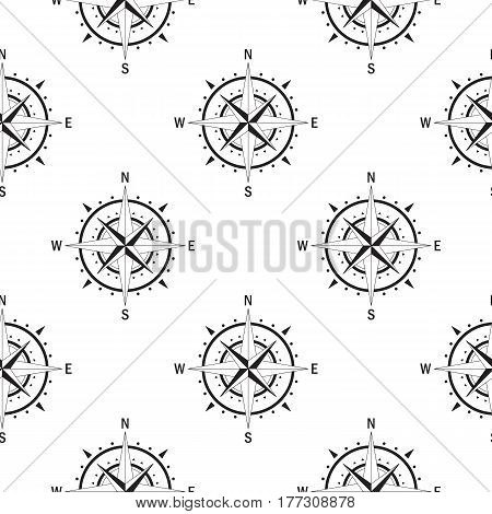 Seamless pattern with the image of a vintage windrose on a white background isolated. The device allows to determine the direction of the cardinal points and prevailing wind direction.
