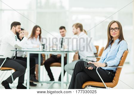leading lawyer of the company on background, business meeting business partners. the photo has a empty space for your text.
