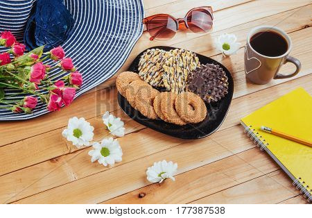 Coffee Espresso Stands On A Wooden Table With Cookies, Pad And Pencil.