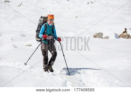 Trekker is walking by Renjo La pass in Everest region