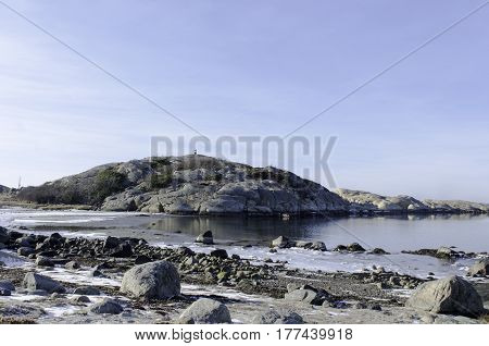 the sun is shining on the rock a winterday on swedish west-coast