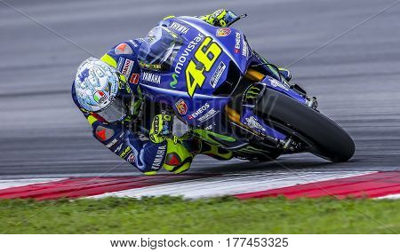 SEPANG MALAYSIA - JANUARY 30 2017 : Movistar Yamaha MotoGP rider Valentino Rossi taking a corner during 2017 MotoGP pre-season test (Winter Test) at the Sepang International Circuit.