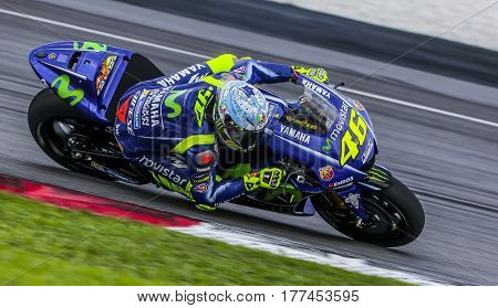 SEPANG MALAYSIA - JANUARY 30 2017 : Movistar Yamaha MotoGP rider Valentino Rossi taking a corner during 2017 MotoGP pre-season test (Winter Test) at the Sepang International Circuit.