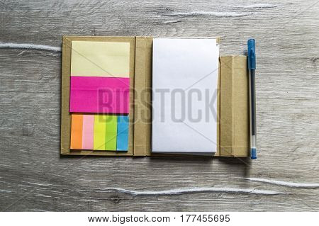 Pencil and note pad for note taking, sticky colored papers, colored sticky paper for taking notes, business man and notepad, business man and organizer,