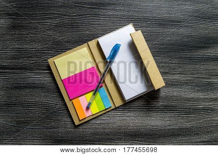 Pencil and note pad for note taking, sticky colored papers, colored sticky paper for taking notes, business man and notepad, business man and organizer,