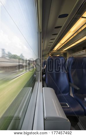 View from train that seems impressionist painting