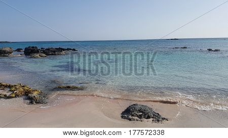 Beach with pink sand on the Island of Crete