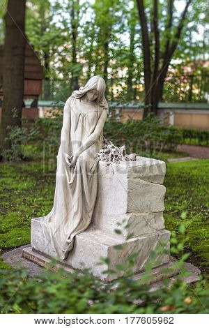 ST.PETERSBURG RUSSIA - AUGUST 04 2013: Tombstone to russian professor of the Conservatory Anna Esipova at Tikhvin Cemetery in St Petersburg
