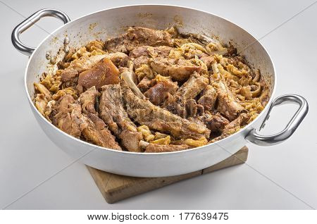 Cassoeula cassola pork meat in a pot isolated on neutral background
