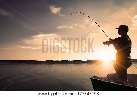 fishing rod lake fisherman men sport summer lure sunset water outdoor sunrise fish