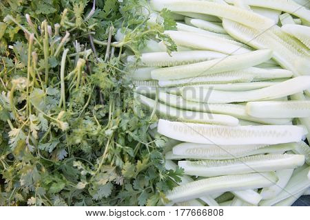 top view of coriander and slice cucumber