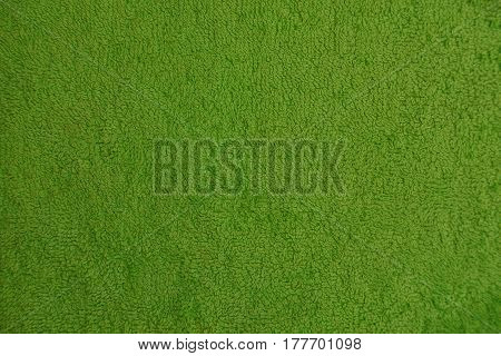 Green wool background from a piece of cloth