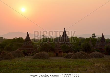 Beautiful ancient pagodas at the sunset in Bagan archaeological zone Myanmar (Burma).