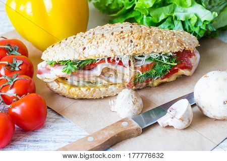 Sandwich with chicken on a whole-wheat bun