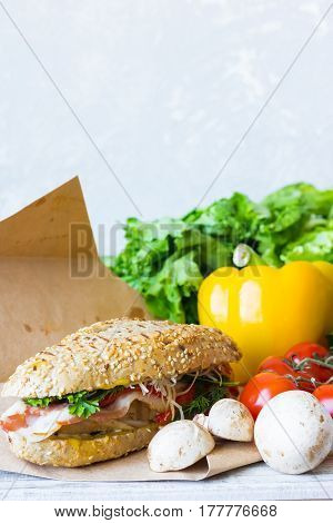 Sandwich with chicken on a whole-wheat bun