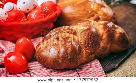 Easter Traditional Bread And Eggs On Wooden Background
