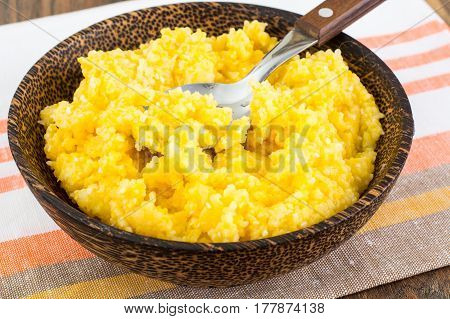 Lean food corn porridge on plate. Studio Photo