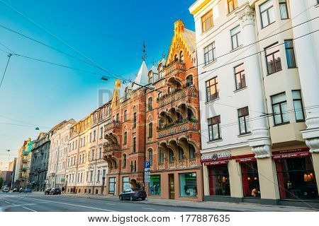 Riga, Latvia - July 1, 2016: Shops And Cafe On Elizabetes Street In Sunny Summer Evening Under Blue Clear Sky.