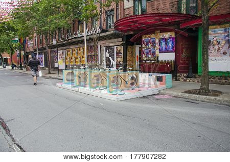 Montreal, Quebec, Canada - 18 July 2016: People Strolling Down Rue St Catherine In The Gay Village O