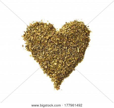 Heart Made Of Spilled Dried Majoram Heap Isolated On White Background